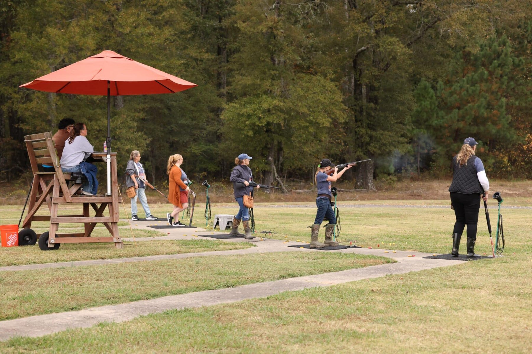 Shooters on the sporting clays course at the Red, White & Shoot Clayshoot