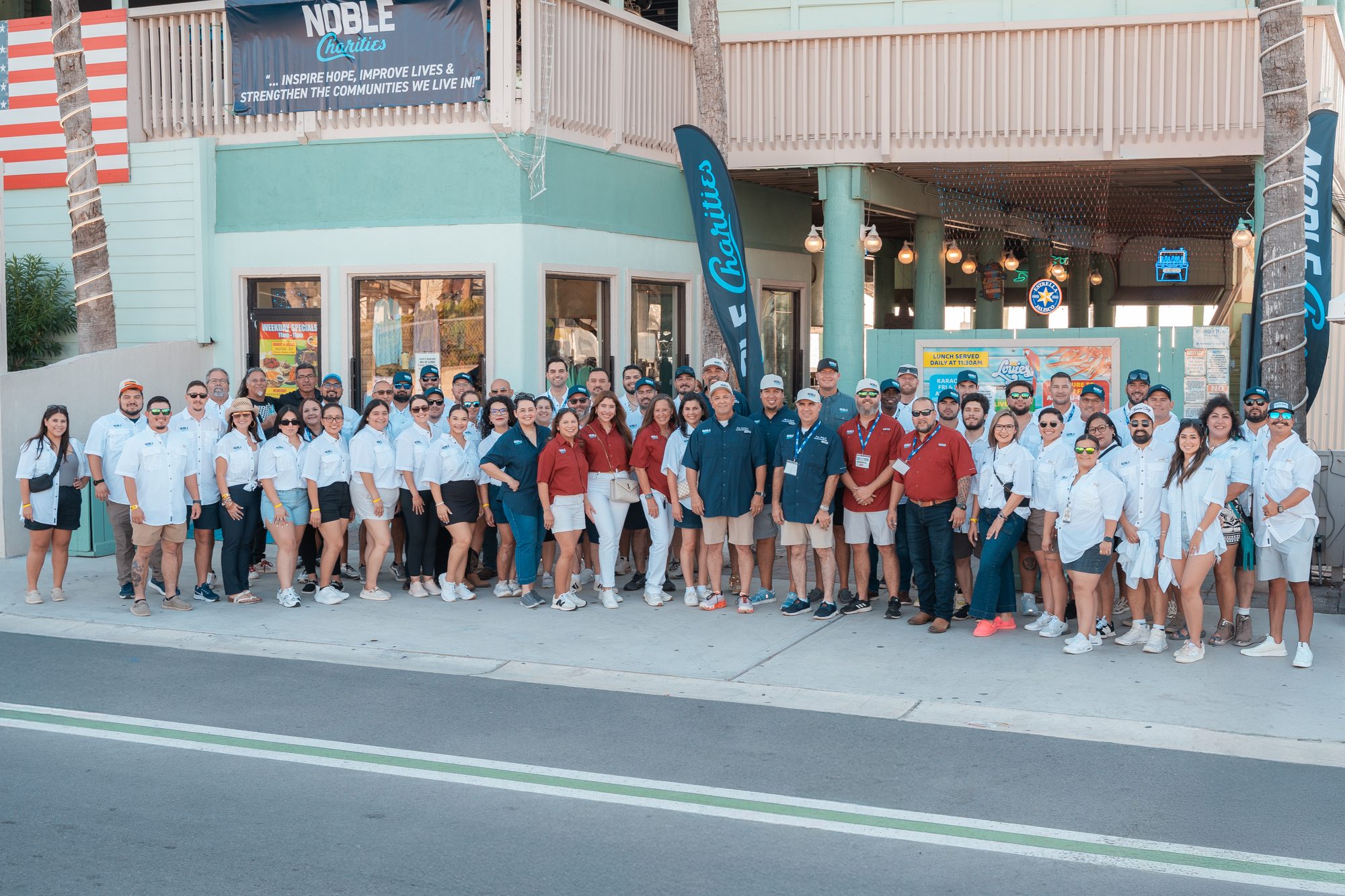 The Noble Charities team gathered outside an annual fundraising event